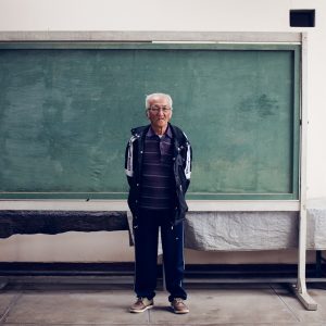 Maximo Kawakami, 2nd generation, in the temple's courtyard. When I ask him if he feels more Japanese or Peruvian after living thirty years in Japan, he replies: "Yo quiero mi Peru" (I love my Peru). San Luis de Cañete, 2017. / Maximo Kawakami, 2ème génération, dans la cour du temple Jionji. Quand je lui demande s'il se sent plus japonais ou péruvien après avoir vécu trente ans au Japon, il me dit « Yo quiero mi Peru » (J'aime mon Pérou). San Luis de Cañete, 2017.